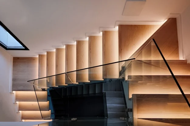 Traprenovatiebedrijven – moderne houten trap met verlichting