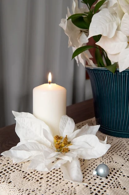 Uitvaartverzorgers – witte bloemen en zacht kaarslicht